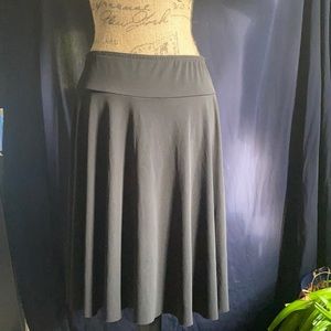 Flowing black skirt with elastic waist band by Briggs New York.